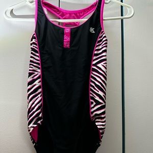 Cute girls swimsuit with matching skirt. Size 10.
